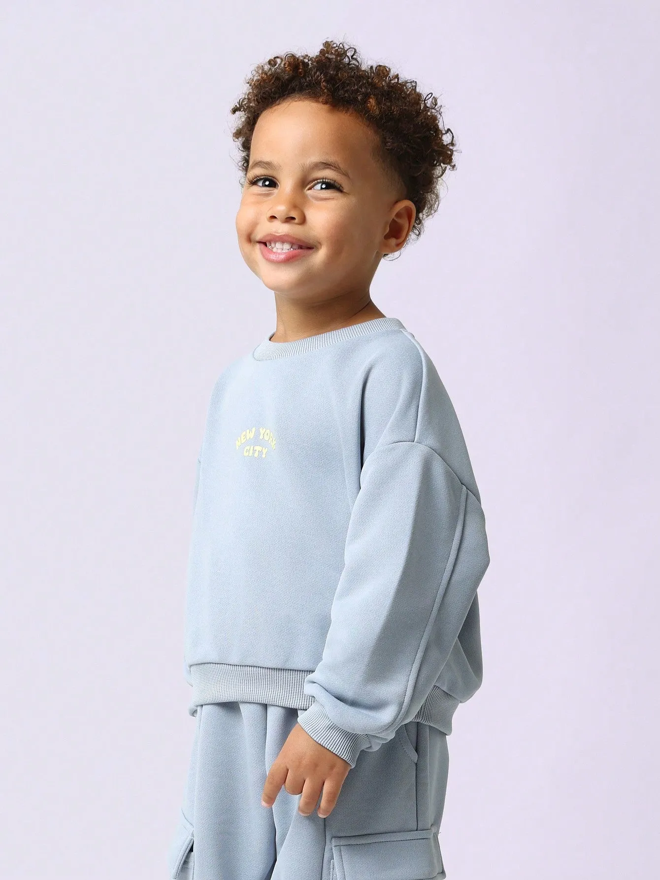 Young Boys Comfy Crewneck Sweatshirt And Cargo Jogger With New York City Graphic Print 2 Piece Set